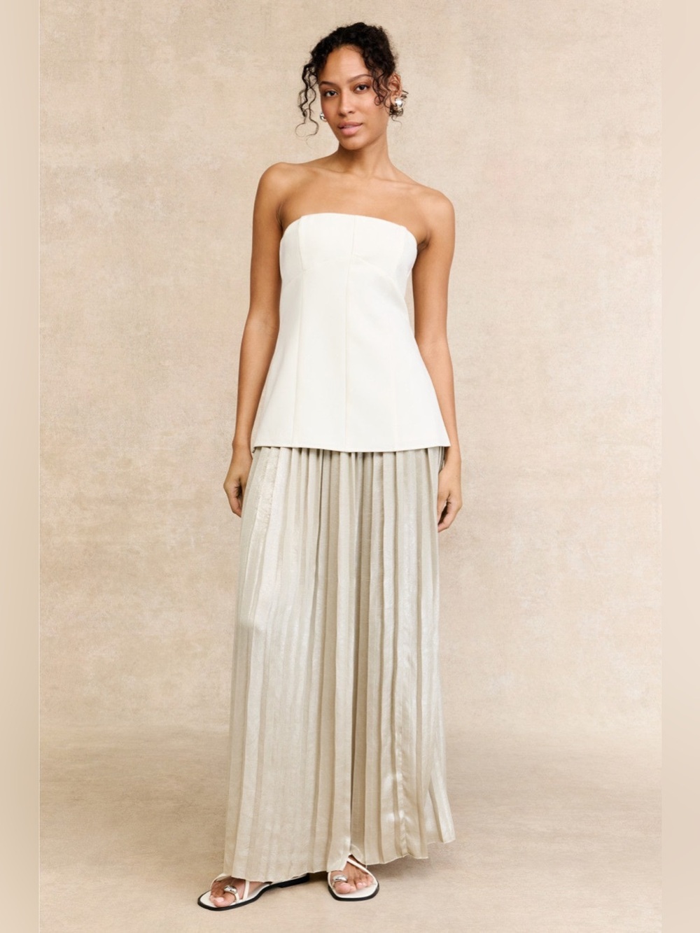 Strapless Ivory Peplum Top with Metallic Pleated Maxi Skirt